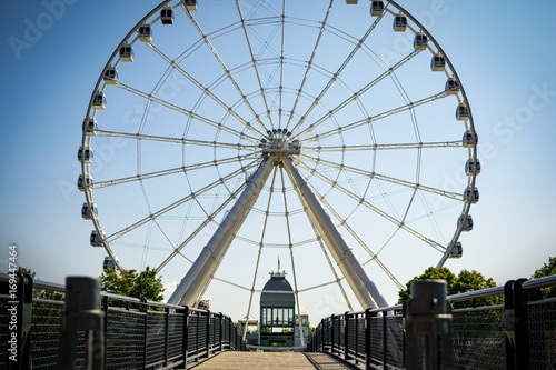 Big ferris wheel with a blue background