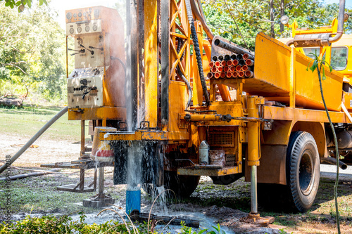 Ground water hole drilling machine installed on the old truck in Thailand. Ground water well drilling. © theeraphong