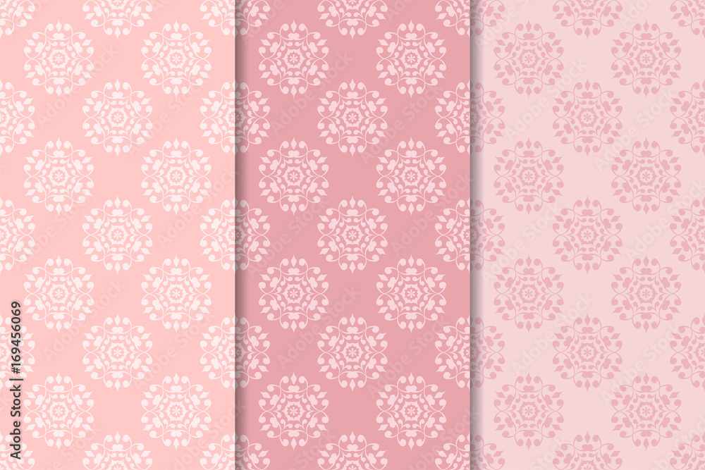 Pale pink set of floral ornaments. Seamless patterns Pale pink set of floral ornaments. Seamless patterns
