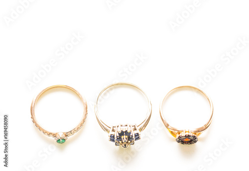 rings with diamonds, emeralds and sapphires, top view