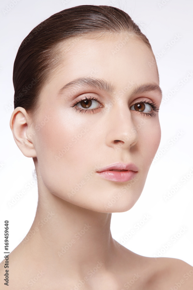 Young beautiful woman with radiant skin and clean make-up Young beautiful woman with radiant skin and clean make-up