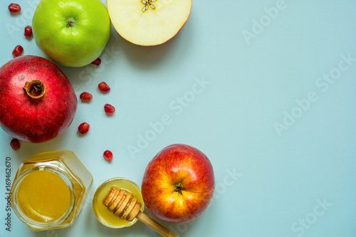 Honey, apple and pomegranate. traditional food for Jewish New Year Holiday, Rosh Hashana