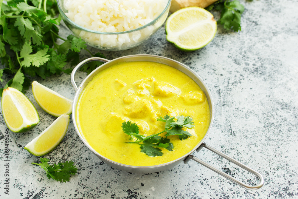 Yellow curry with chicken and rice. Asian cuisine. Yellow curry with chicken and rice. Asian cuisine.