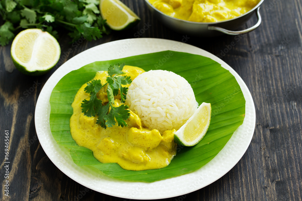 Yellow curry with chicken and rice. Asian cuisine. Yellow curry with chicken and rice. Asian cuisine.
