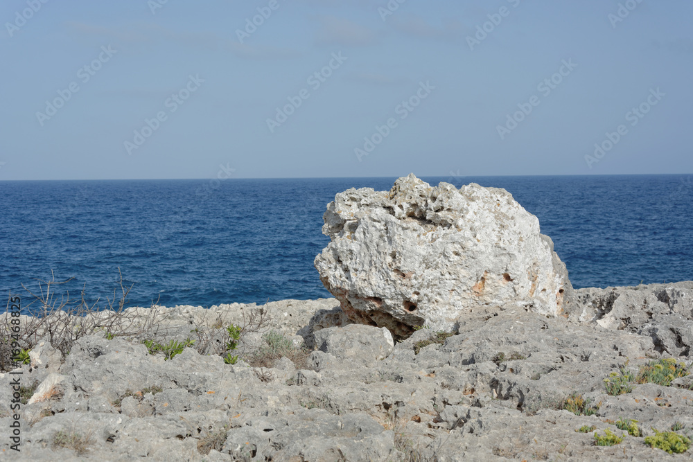 Rock, sky and sea