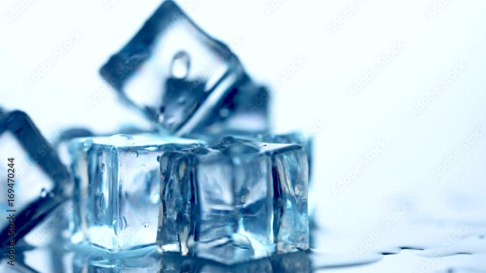 Ice cube. Closeup of melting ice cubes. Rotation 360 degrees. 4K UHD video footage. Ultra high definition 3840X2160 Ice cube. Closeup of melting ice cubes. Rotation 360 degrees. 4K UHD video footage. Ultra high definition 3840X2160