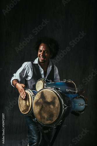 Percussionist Playing Bata Drums photo