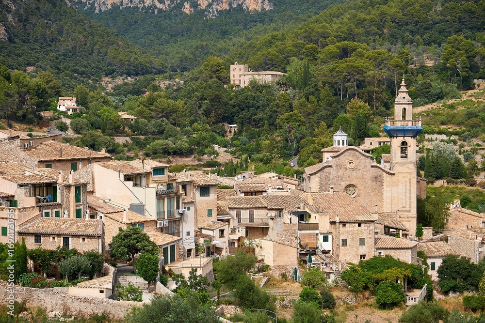 Mediterranean village in the Tramuntana mountains, view of Valldemossa, beautiful landscape of Majorca island Spain