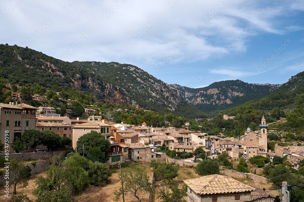 Mediterranean village in the Tramuntana mountains, view of Valldemossa, beautiful landscape of Majorca island Spain