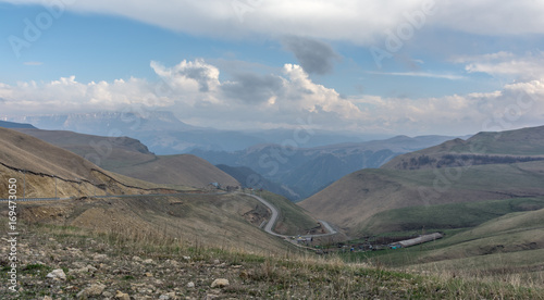 Mountain road. The North Caucasus. Cloudy summer evening. 