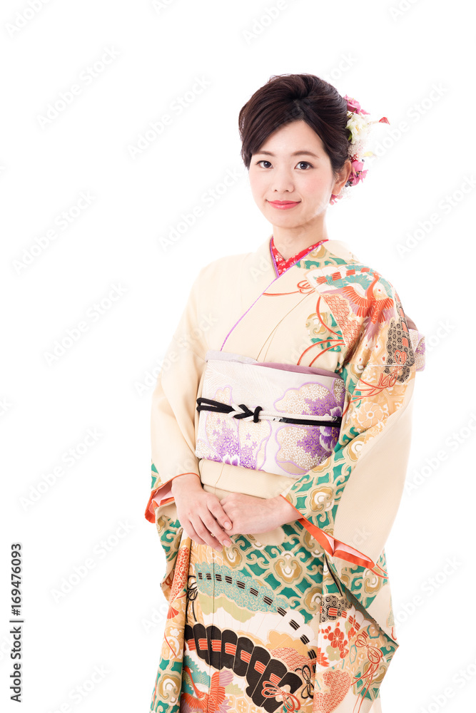 portrait of young asian woman wearing traditional kimono isolated on white background