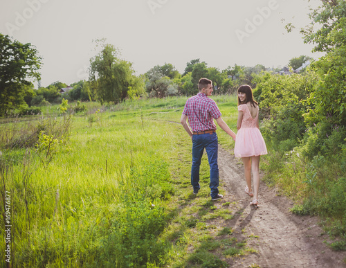 young couple in love together on nature