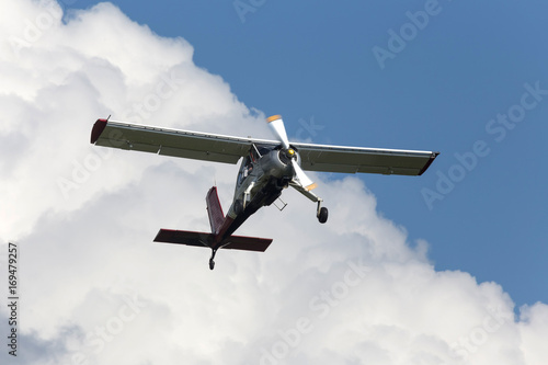 sport motor airplane in the air photo