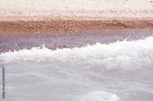 sea wave and pebble beach