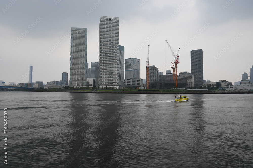 Water taxi and water front district in Tokyo Japan