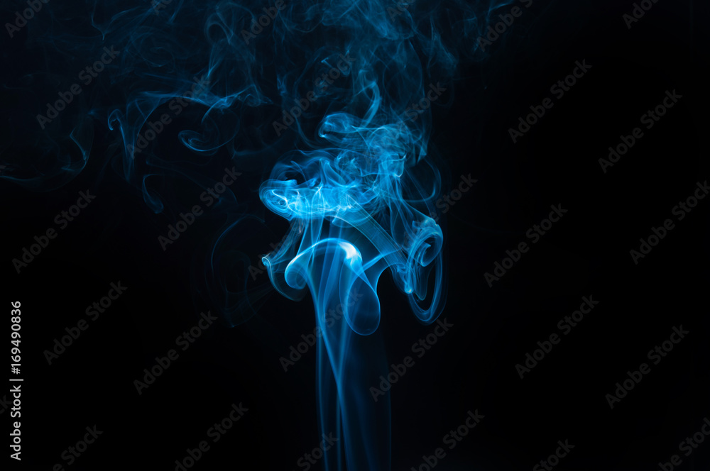 Fototapeta premium blue smoke on black background