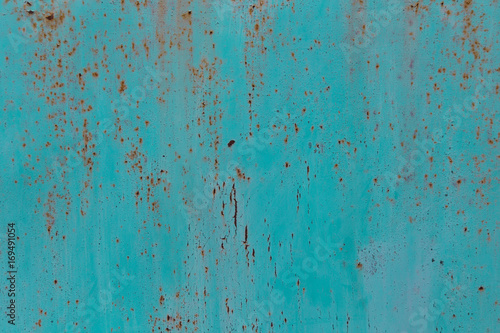 Turquoise rusty grunge metal texture. Photo background.