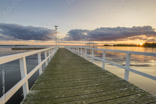 Sunset on the lake, wooden, white pier © Mike Mareen