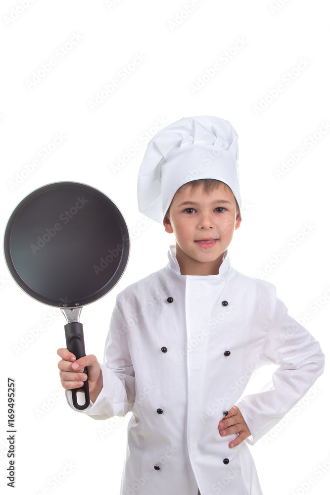 Smiling chef boy holding frying pan on white background Smiling chef boy holding frying pan on white background