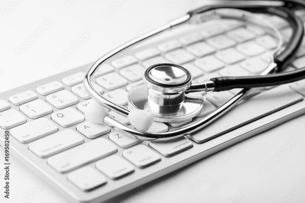 Stethoscope with a modern computer keyboard Stethoscope with a modern computer keyboard