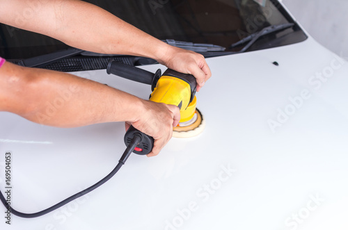 Wallpaper Mural Polishing the white car with reflection, car care concept Torontodigital.ca