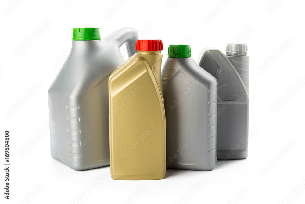 Plastic bottles from automobile oils isolated on white Plastic bottles from automobile oils isolated on white