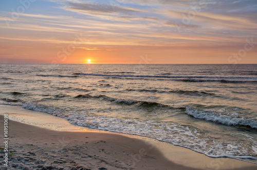 Fototapeta Naklejka Na Ścianę i Meble -  Beautiful summer sunset over Baltic sea. 
