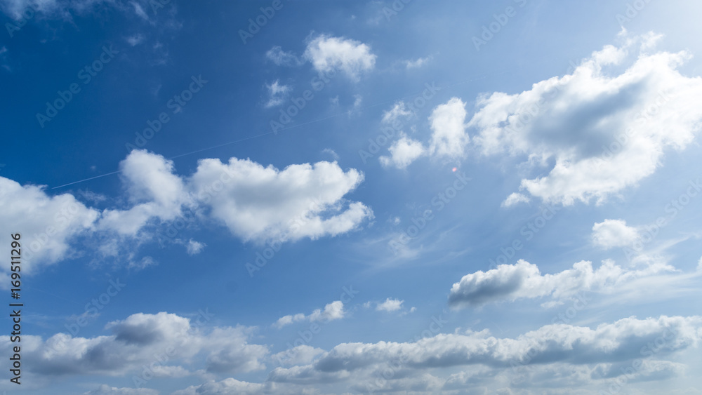 Blue sky with clouds and sun Blue sky with clouds and sun
