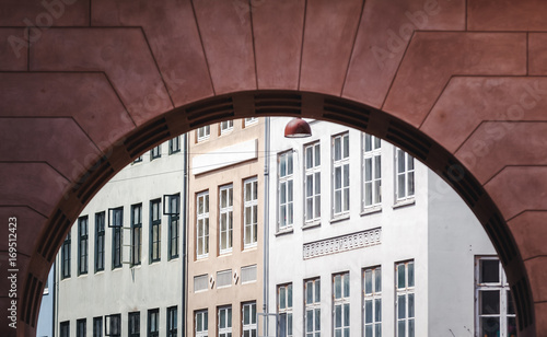 Photography facades of old historical buildings in the arch, architectural background and te