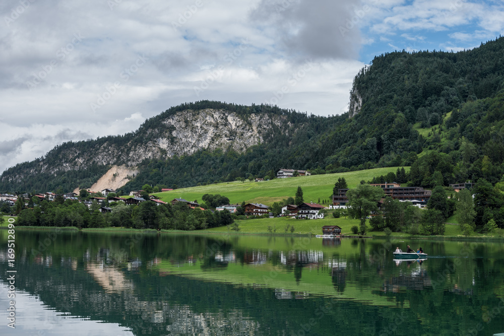 The mountain lake Thiersee in Tyrol, Austria The mountain lake Thiersee in Tyrol, Austria