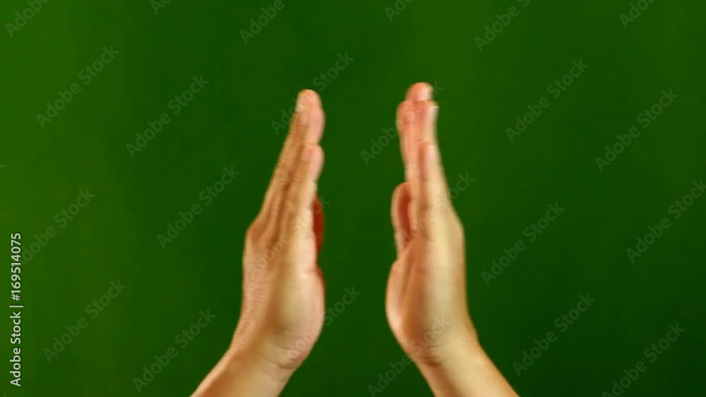 clapping hands with green background