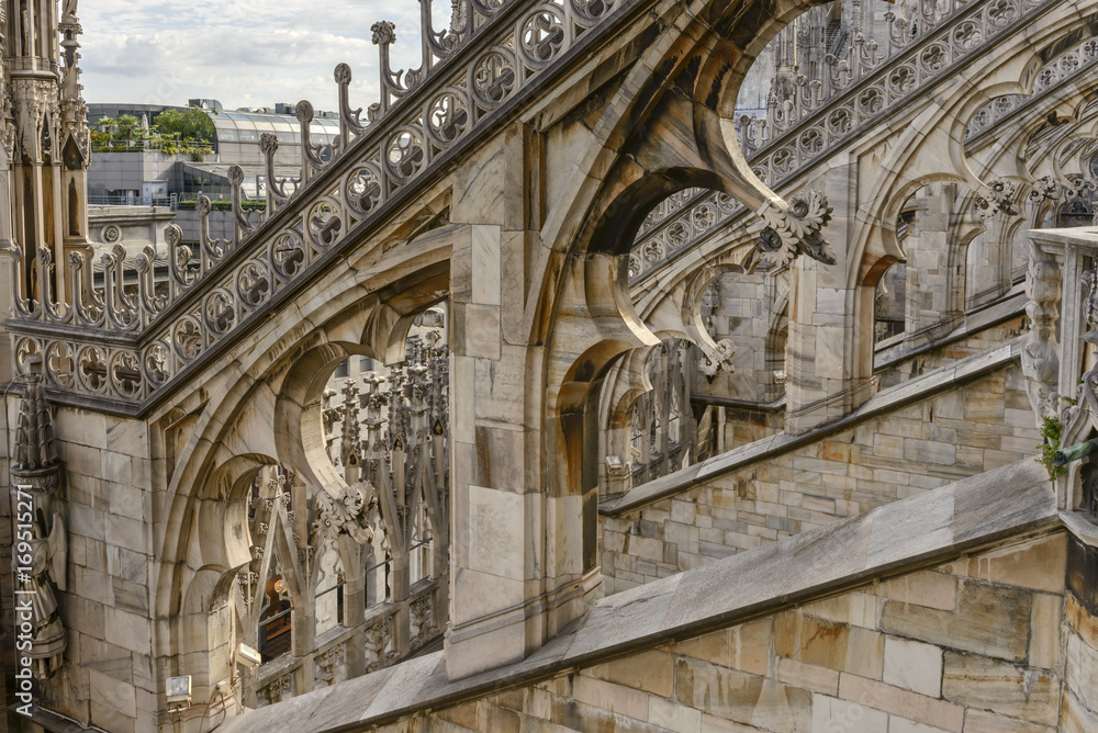 arches on marble flying buttress at Cathedral, Milan, Italy