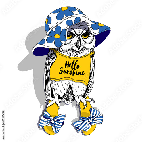 Cartoon Owl in a blue sun floral hat, in a yellow t-shirt and with a sandals. Vector illustration. photo