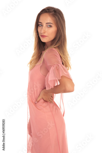 side portrait of a young blonde woman wearing dress © Viorel Sima