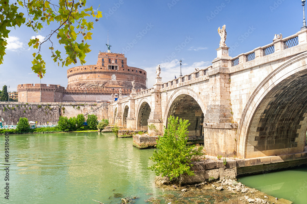 Fototapeta premium The Mausoleum of Hadrian, usually known as Castel Sant'Angelo (Castle of the Holy Angel) and Sant' Angelo Bridge. Rome. Italy.