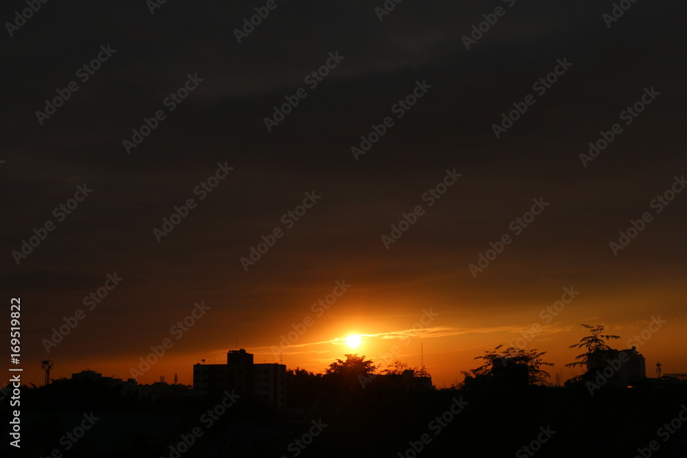 sunset view with building and trees in city,romantic sky, nice background, Silhouette sky