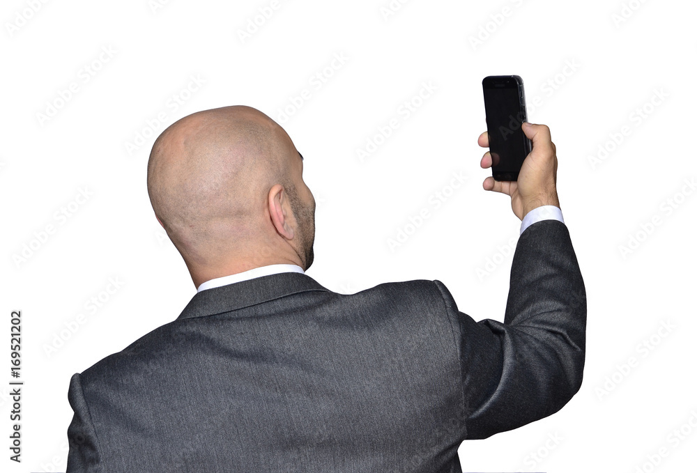 Naklejka premium Selfie del ejecutivo con el telefono smatphone.