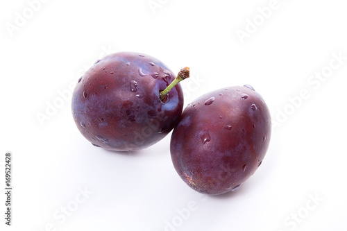 Group of ripe plums isolated on a white background..