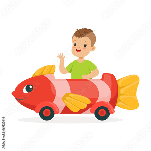Cute little boy riding on toy fish car, kid have a fun in amusement park cartoon vector Illustration