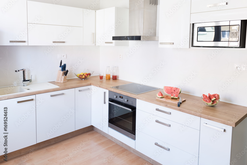 New modern white kitchen interior background New modern white kitchen interior background