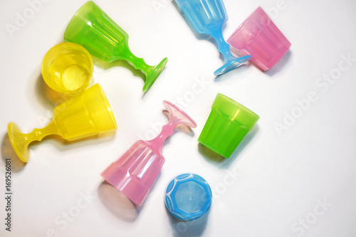 Colorful plastic glasses top view