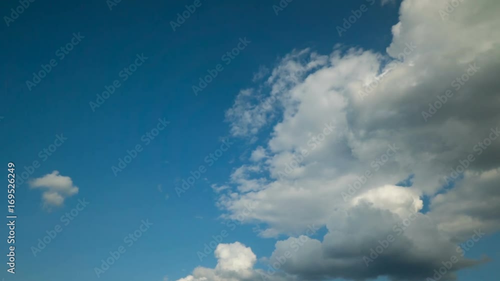Time lapse movement of cumulus of clouds in the blue sky Time lapse movement of cumulus of clouds in the blue sky