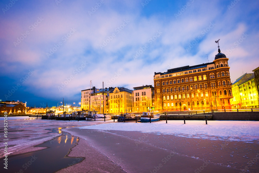 Scenic winter view the frozen Old Port in Katajanokka district  in Helsinki, Finland