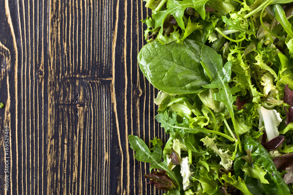 Fototapeta premium Fresh green salad with spinach,arugula and lettuce