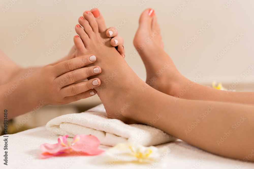 woman having feet massage