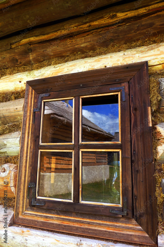 Window on wooden house
