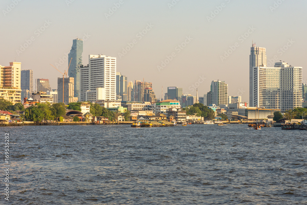 The Chao Phraya is a major river in Thailand. The watercourse meanders through the city in southward direction, emptying into the Gulf of Thailand approximately 25 kilometres  south of the city centre