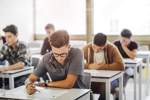 High School Students Taking Exam photo