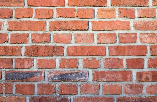 red grunge brick wall