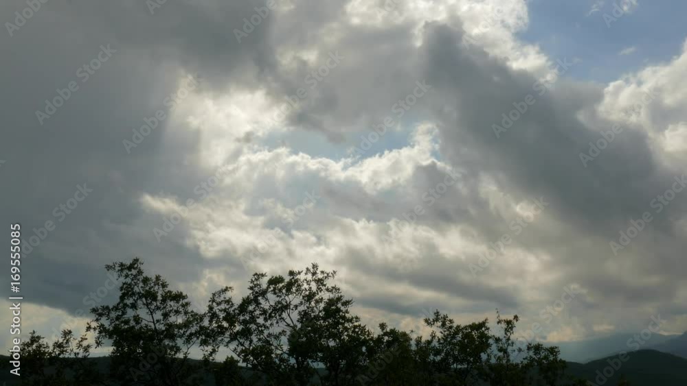 Grey clouds in blue sky, time lapse / Storm clouds in blue sky, time lapse Grey clouds in blue sky, time lapse / Storm clouds in blue sky, time lapse